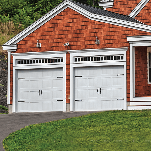 Stamped Carriage Short Garage Door shown in white with spade hardware.