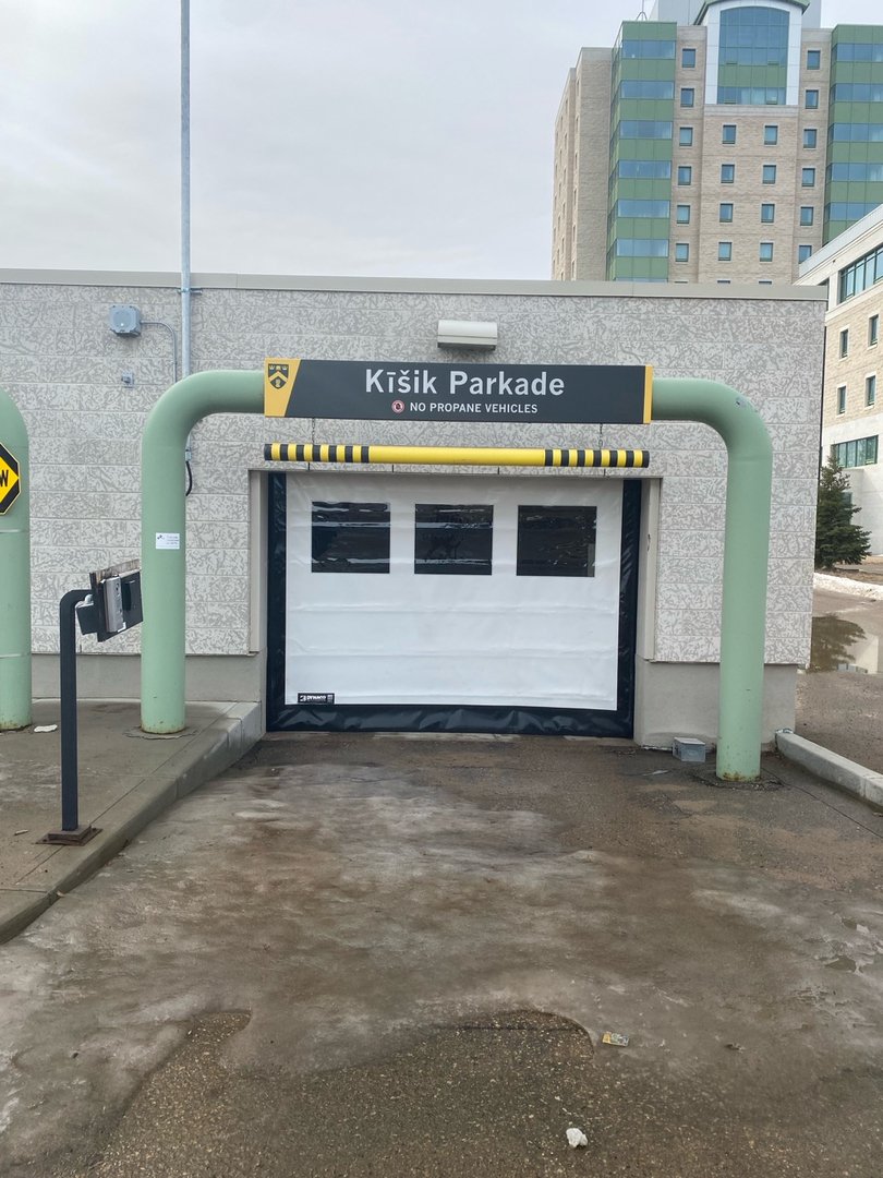 White overhead door at a public parkade entrance